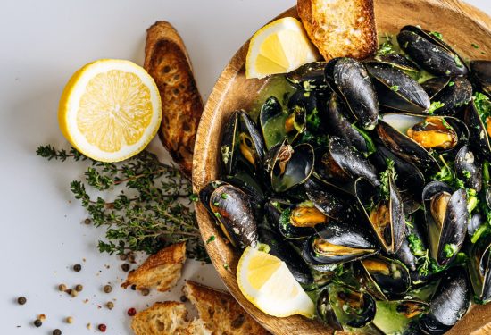 fragrant boiled mussels in herb and cream sauce